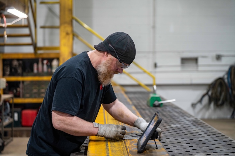 A man working on a steel project